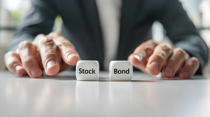Cube on the table with word “Stock” and “Bond”, selecting or diversifying investments in stocks and bonds, risk and portfolio management concept