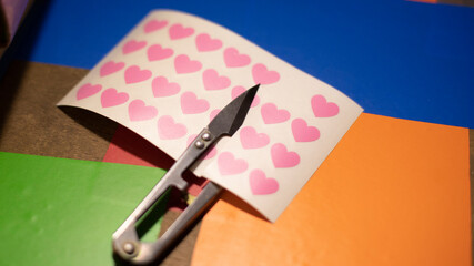 Stickers texture of hearts. Plotter cutting. Making stickers for decorating gifts.