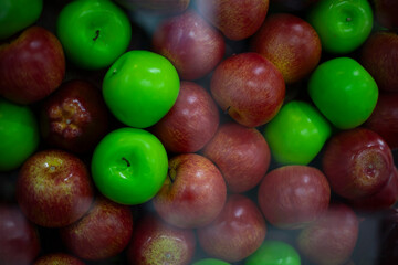 Apple texture. Apples behind glass. Healthy food.