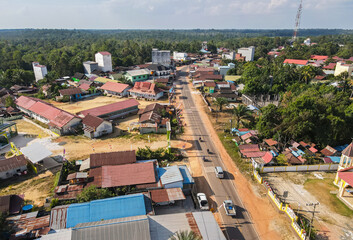 View from above of a small town in Cempaga Hulu District, East Kotawaringin Regency, Central Kalimantan, Indonesia. You can see a tall building that is used as a swallow's nest.