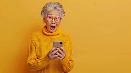 elderly woman Staring at the phone Image of her surprise as she contemplates whether to watch a shocking video or explore a tempting offer. The scene is set against a bright yellow background. - obrazy, fototapety, plakaty