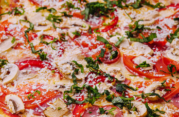 Delicious freshly baked pizzas close up