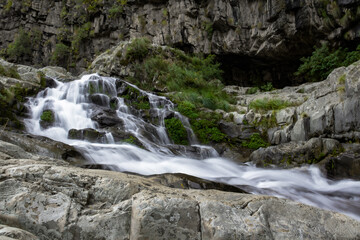 Obraz premium Beautiful waterfall with crystal clear water and rocks in summer in the city of Tarija - Bolivia