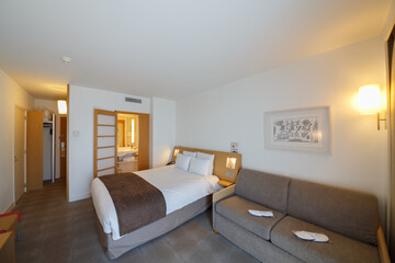  Novotel hotel, beautiful interior of hotel room, view bedroom, sofa, bathroom