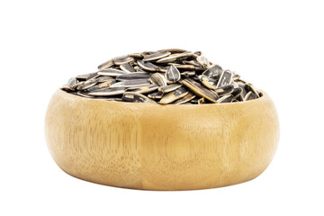 Sunflower seeds in a wooden bowl, healthy natural food Isolated on a white background - clipping path