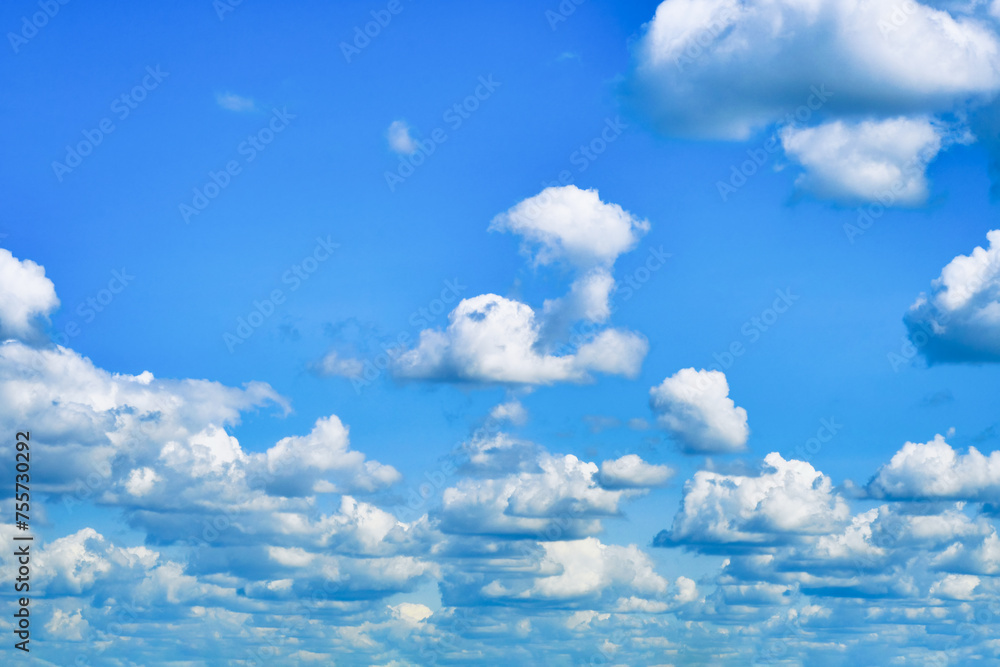 Wall mural sky with large cumulus clouds. serene background on the theme of calm.