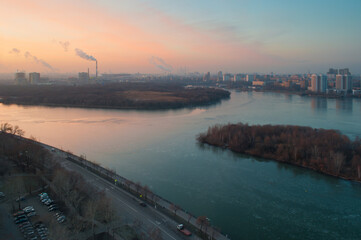 Nagatinskaya quay, sunrise and Moskva river with floating ice in Moscow
