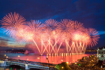 Crowd on Palace Bridge look at beautiful fireworks at night in St. Petersburg, Russia. I have only...