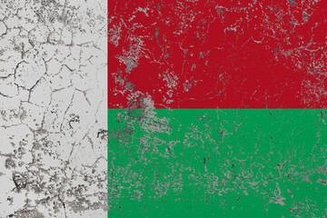 Destructible, crumbling stone wall. Conceptual background in colors flag of Madagascar