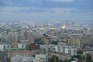 Many residential buildings and roofs at summer evening in Moscow, Russia