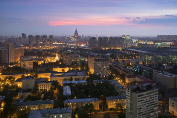 Residential buildings in sleeping area, skyscrapers and roofs at summer night in Moscow, Russia, Khoroshyovsky District