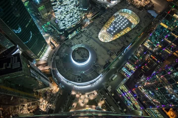 Selbstklebende Fototapeten  Top view of shopping and entertainment complex Central Core of business complex Moscow City at night. Investments in project Central Core - 300 million dollars © Pavel Losevsky