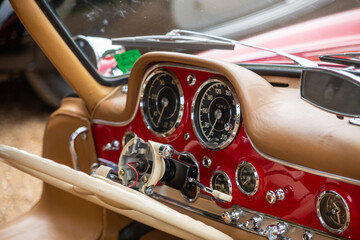 Interior of a classic car with fold down steering wheel