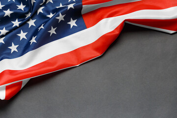 American flag on a black background, copy space. Symbol of independence, patriotism.