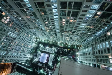 Foto op Plexiglas  Part of modern building of residential complex Airbus and car parking at dark night © Pavel Losevsky