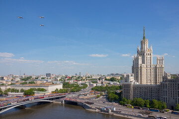 Three aircrafts fly during military parade on anniversary of Victory in World War II in Moscow,...