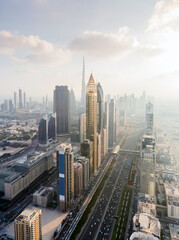 Fototapeta na wymiar Sheikh Zayed highway, Rose Rayhaan by Rotana, Ahmed Abdul Rahim Al Attar Tower in Dubai, UAE