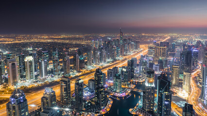 Beautiful Dubai Marina area and highway with illumination at night, Dubai, UAE