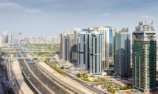 Sheikh Zayed Road and Dubai Marina area at suuny day in Dubai, UAE