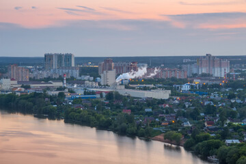Cottage village, residential buildings near river in Krasnogorsk, Russia at summer