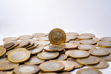 Pile of coins isolated on white background with copy space for text. Indian ten rupees coins
