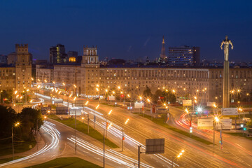 South gate and Stella monument to Gagarin (first spaceman) in Moscow, Russia at night