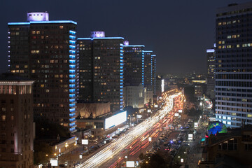 Fototapeta na wymiar Beautiful Night Highway New Arbat at night in Moscow, long exposure