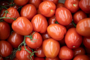 Red tomatoes. Vegetable texture. Tomatoes in the store.