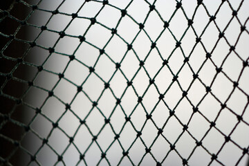 Koliwada, Maharashtra / India - October 06, 2006 : A close-up view of the wire mesh in the village.