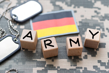 Germany army uniform patch flag on soldiers arm. Military Concept.