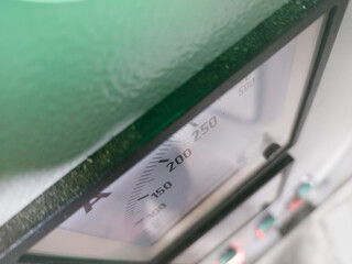 Analog Amper meter , scale of current measurement on the top view.