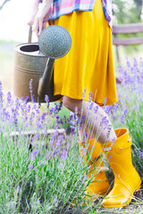 girl holding watering can