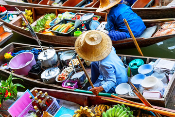 Traditional floating market in Damnoen Saduak near Bangkok, Thailand. - 755778458