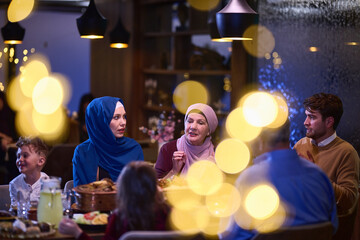A modern and traditional European Islamic family comes together for iftar in a contemporary restaurant during the Ramadan fasting period, embodying cultural harmony and familial unity amidst a