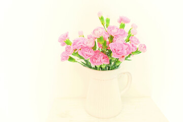 Fototapeta na wymiar ピンクのカーネーションの花の背景