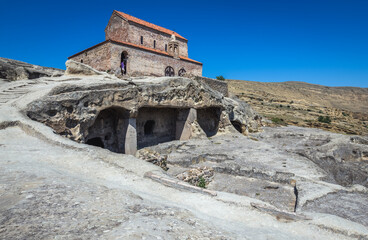 Fototapeta na wymiar Christian basilica in Uplistsikhe ancient rock-hewn town, Georgia
