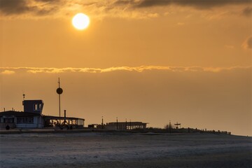 Evening atmosphere on the sandy beach of Cuxhaven, sunset