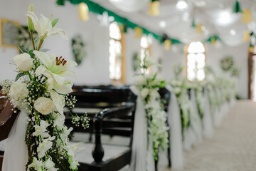 Interior of the church with decoration for wedding with candles light
