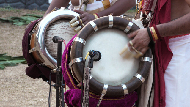 Drum artists playing Thavil, a South Indian percussion musical instrument