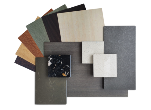 top view of interior material samples board including black terrazzo, quartz, artificial stone, wooden veneer and laminated isolated on background with clipping path. materials palette, top view .