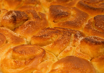 freshly made tray of cinnamon rolls, macro food background
