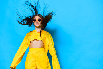 young woman attractive yellow model beautiful trendy lifestyle girl sunglasses fashion - obrazy, fototapety, plakaty