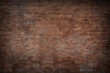 Background and Wallpaper or texture of dark discolored old brick wall ancient vintage retro style.
