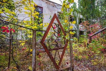 Gate of Cheburashka kindergarten in Pripyat abandoned city in Chernobyl Exclusion Zone, Ukraine