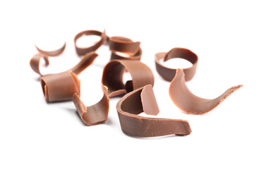 Many delicious chocolate shavings isolated on white