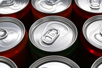 Energy drink in cans, closeup. Functional beverage