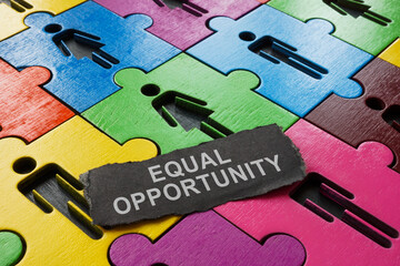 Equal opportunity concept. A puzzle of colored figures and a paper strip.