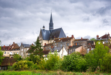 Picturesque view of Montresor village with  church of Saint John the Baptist. Indre-et-Loire,...