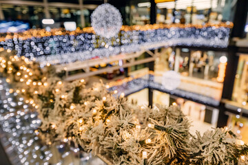 bustling holiday spirit comes alive in the vibrant atmosphere of the Christmas market, where shoppers delight in festive decorations and colorful displays.
