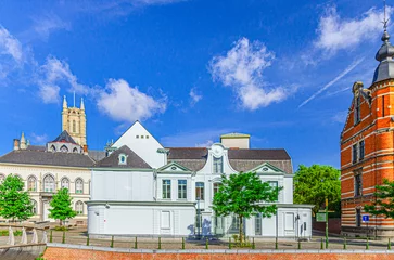 Fotobehang Gouverneurswoning Governor's House and Episcopal Palace buildings on promenade embankment in Ghent city historical center, East Flanders province, Flemish Region, Belgium © Aliaksandr